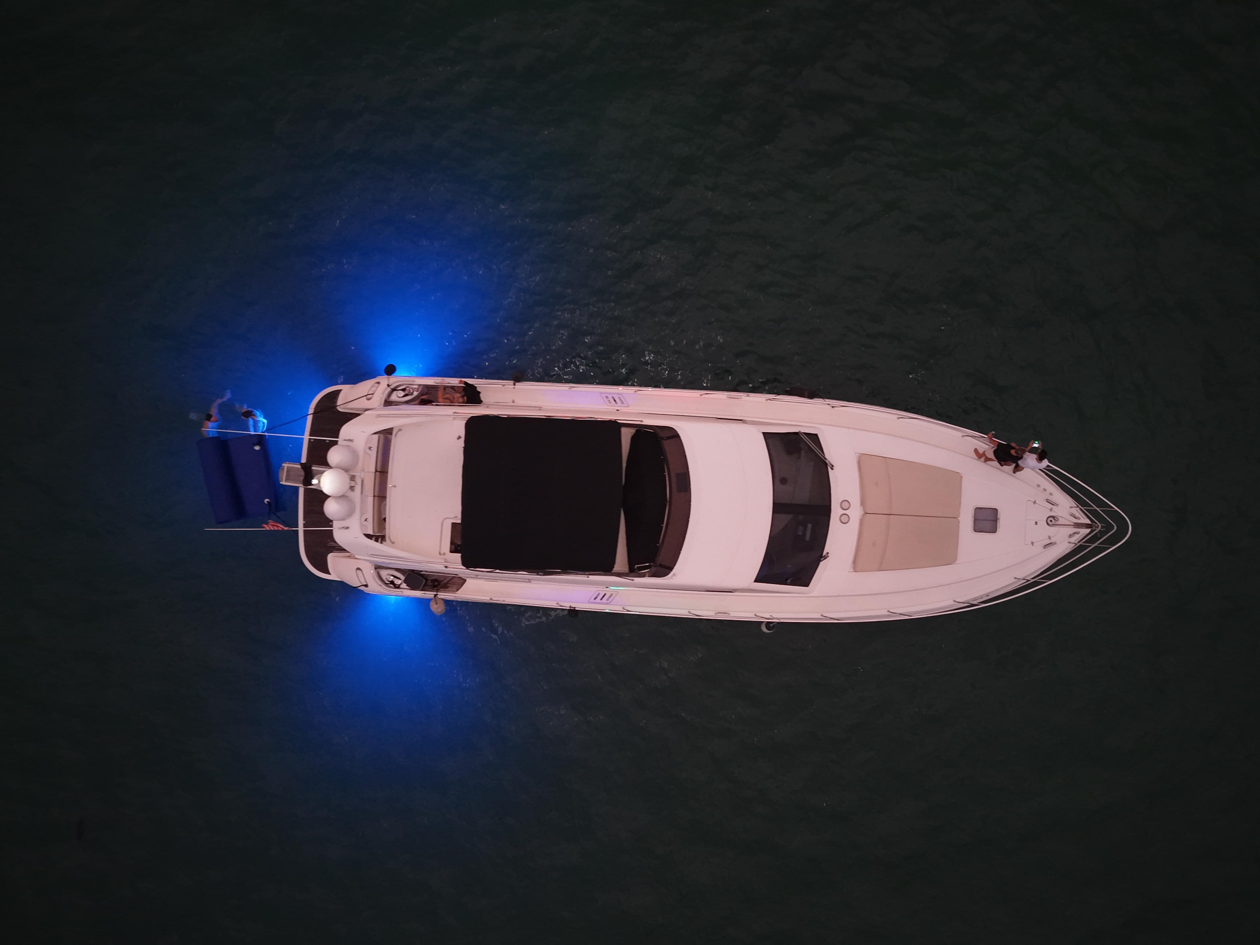 Samba Soul glowing on dark water at night